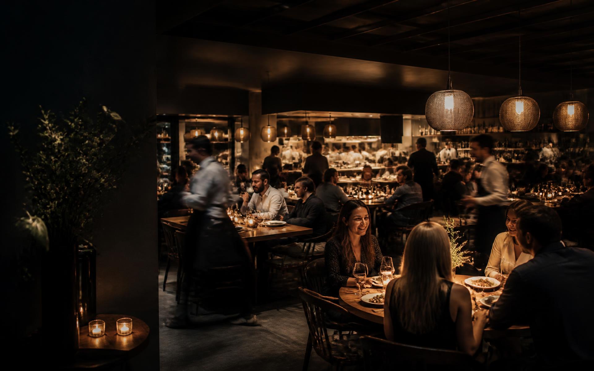 Busy restaurant dining room during evening service